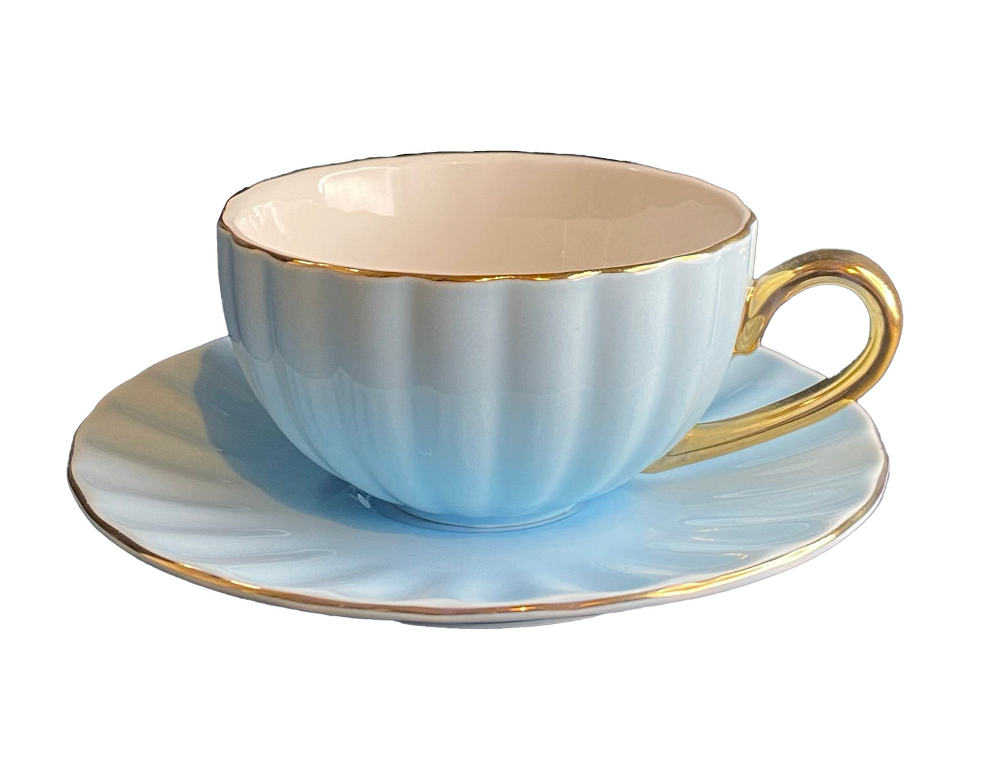 Tazza a "conchiglia" da The con piattino