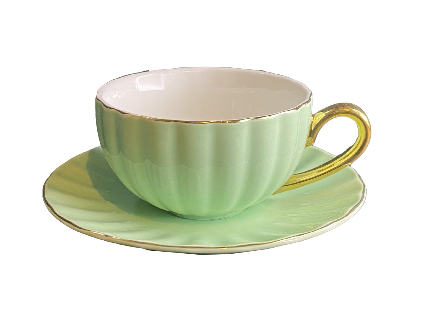 Tazza a "conchiglia" da The con piattino