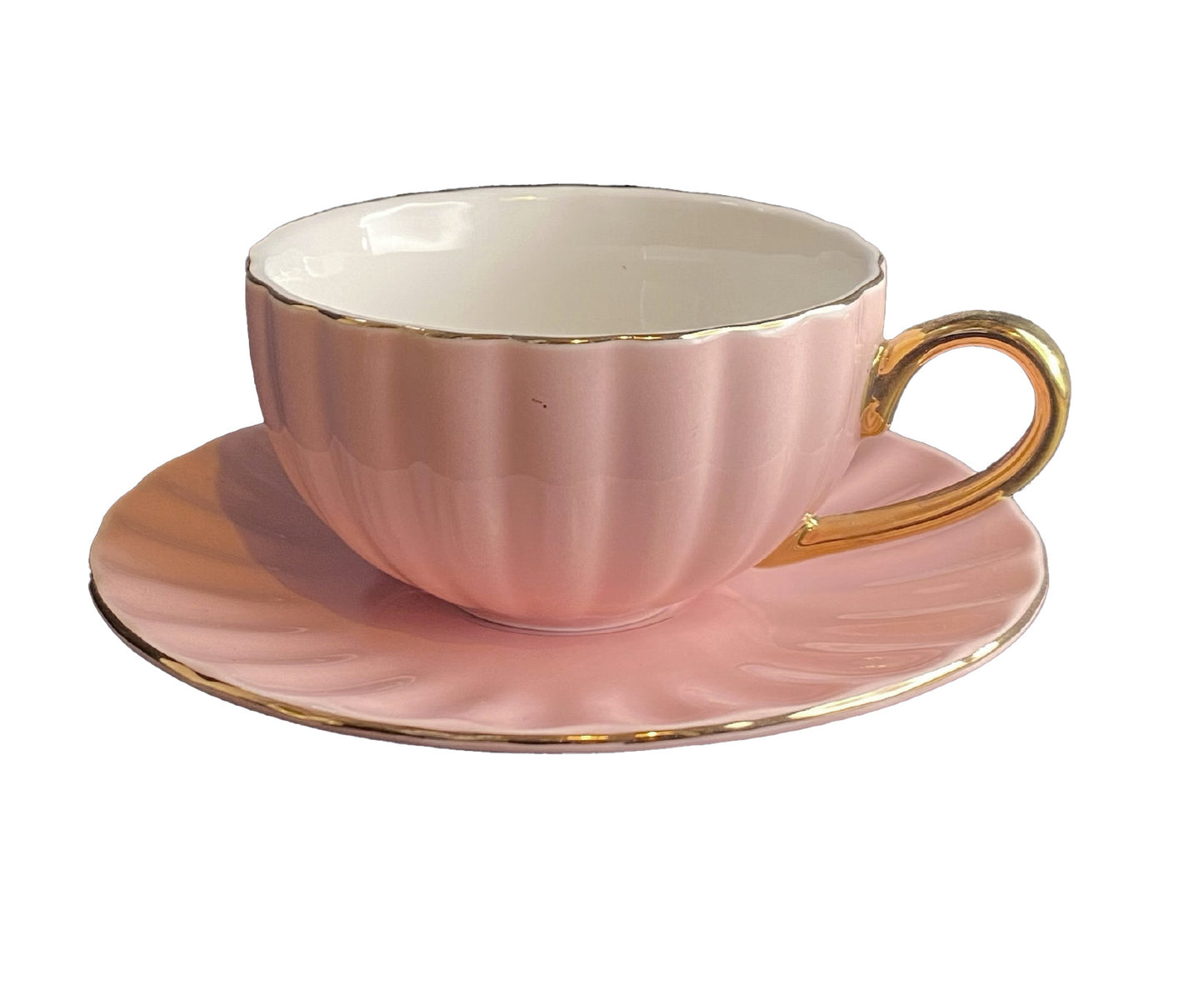 Tazza a "conchiglia" da The con piattino
