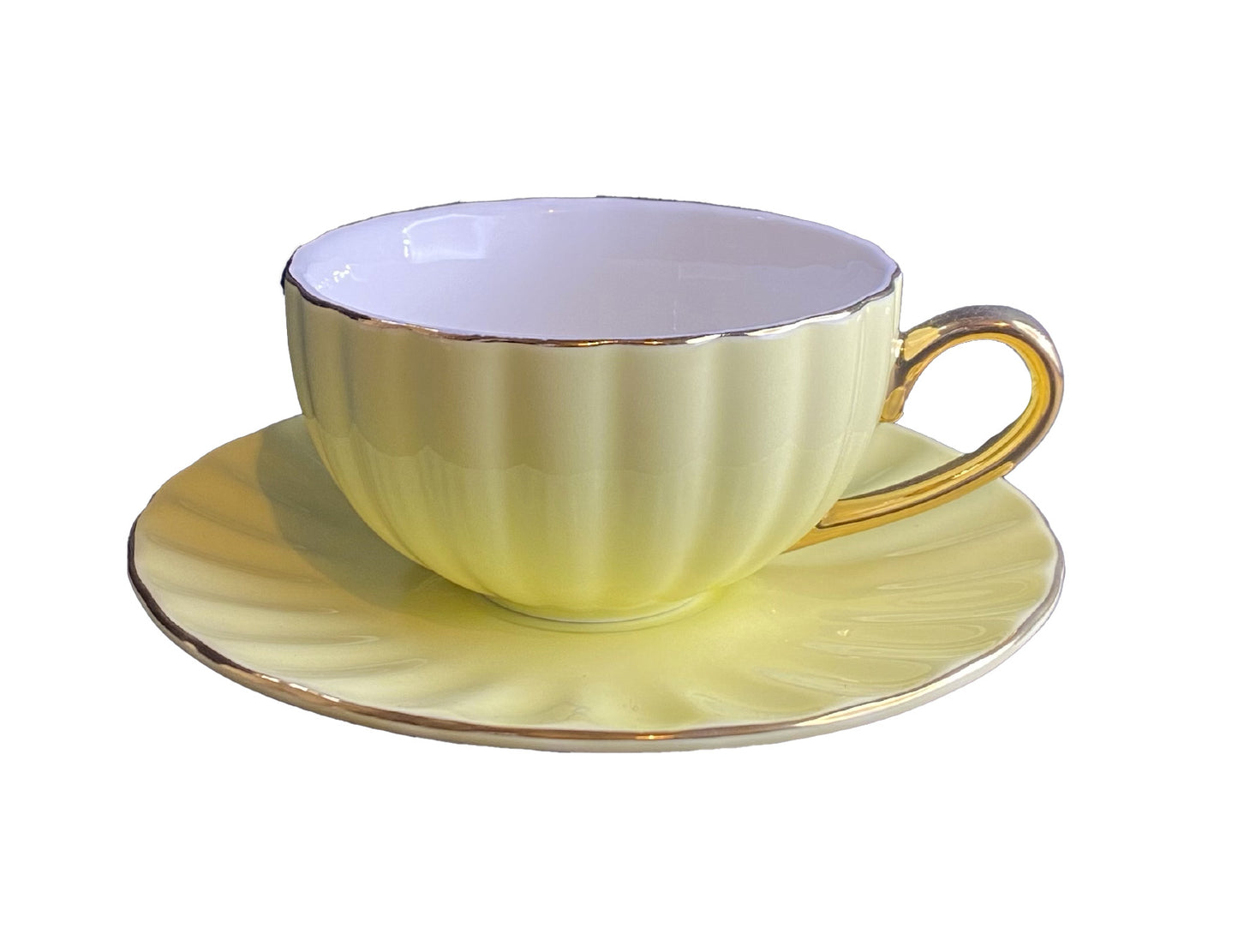 Tazza a "conchiglia" da The con piattino